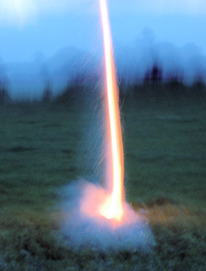 A rocket launching at dusk.